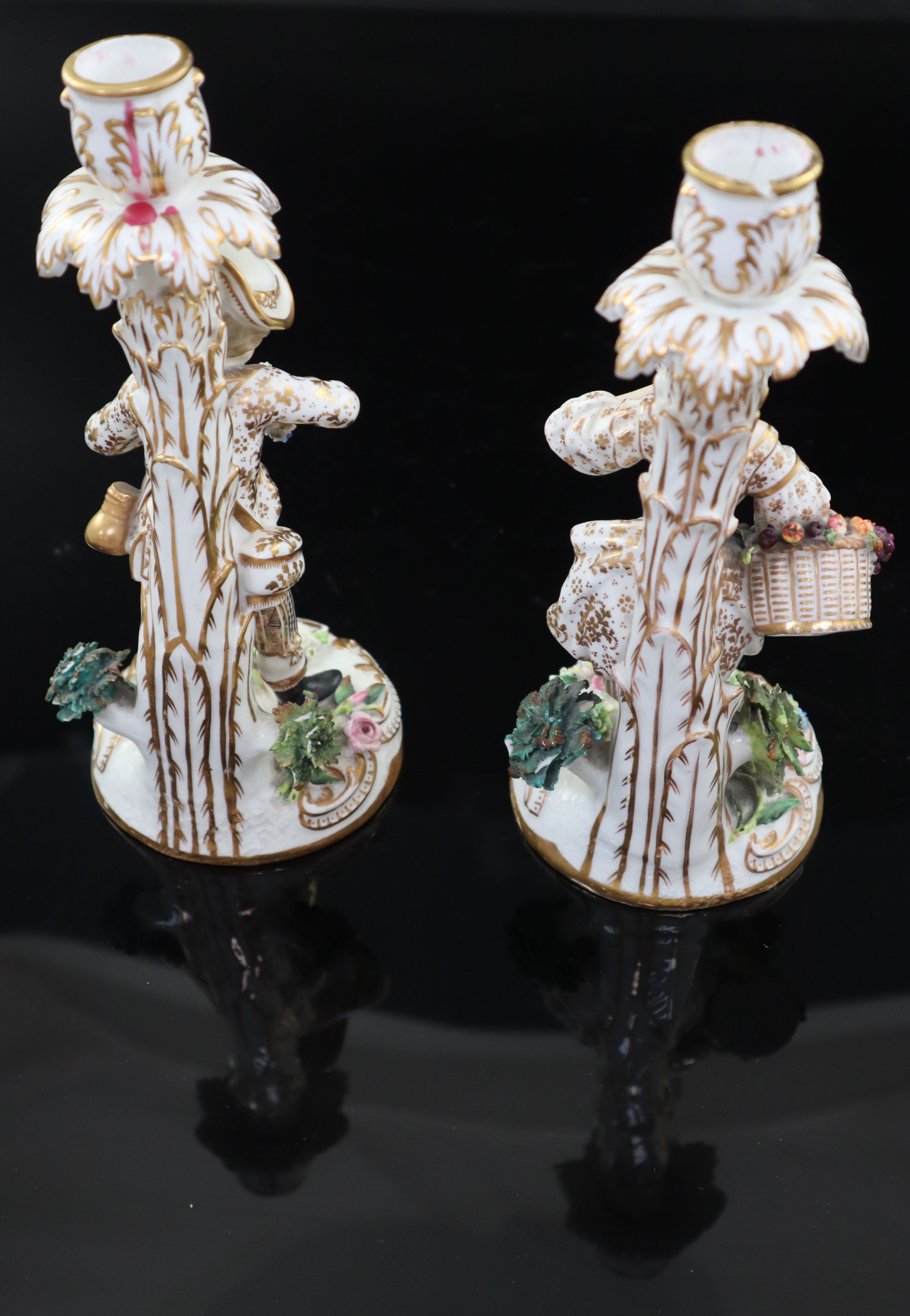 A pair of Victorian John Bevington bone china candlesticks, height 21.5cm